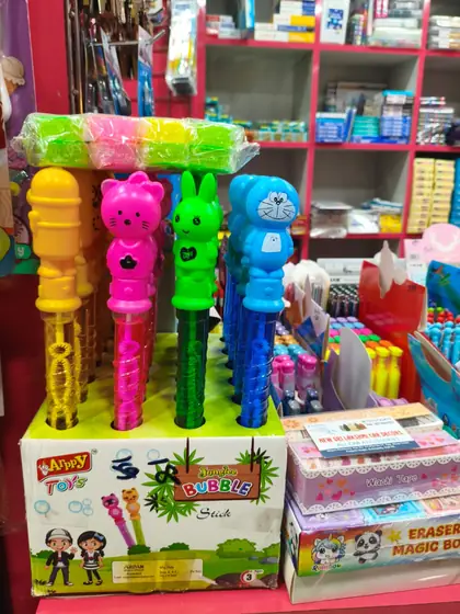 Character bubble sticks and novelty toys at the counter
