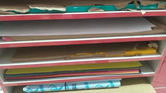 Chart paper, ivory sheets and drawing sheets stored flat in racks