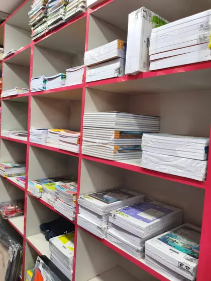 Racks of files, folders and paper reams