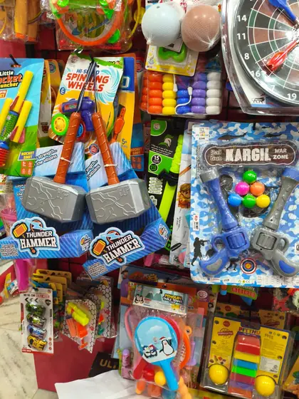 Dart boards, toy hammers and outdoor play toys