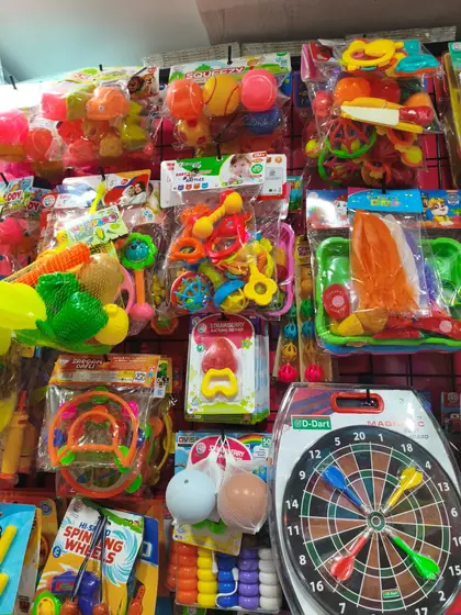 Wall display of toys across age groups and price ranges