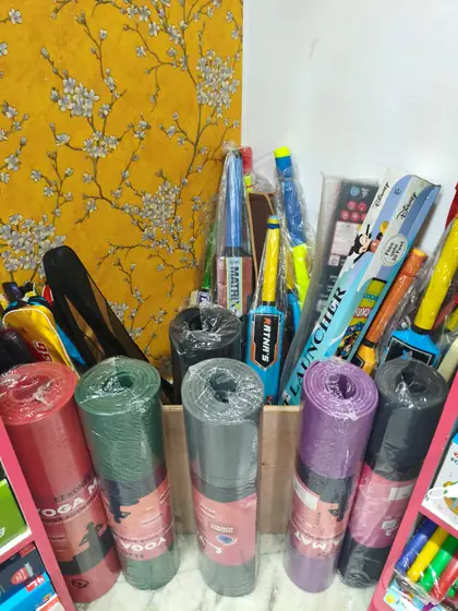 Rolled yoga mats in several colours